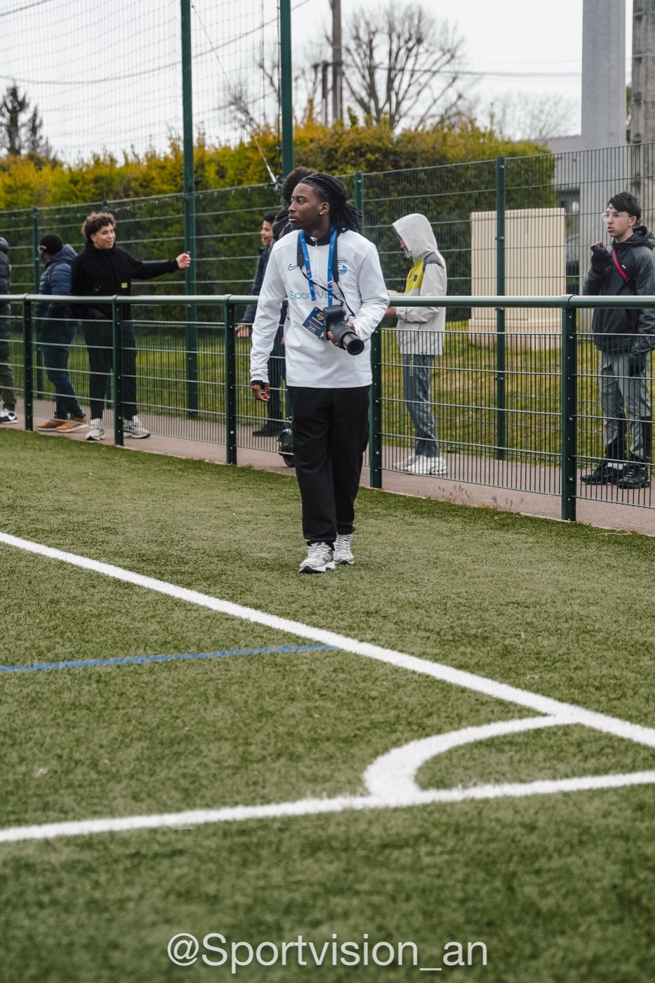 Photographe SportVision accrédité en bord de terrain